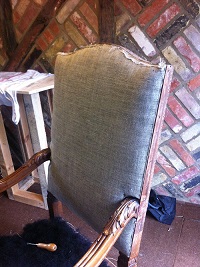 The hair is contained within linen scrim