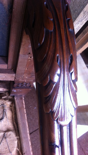 Chair arm adjoining chair back